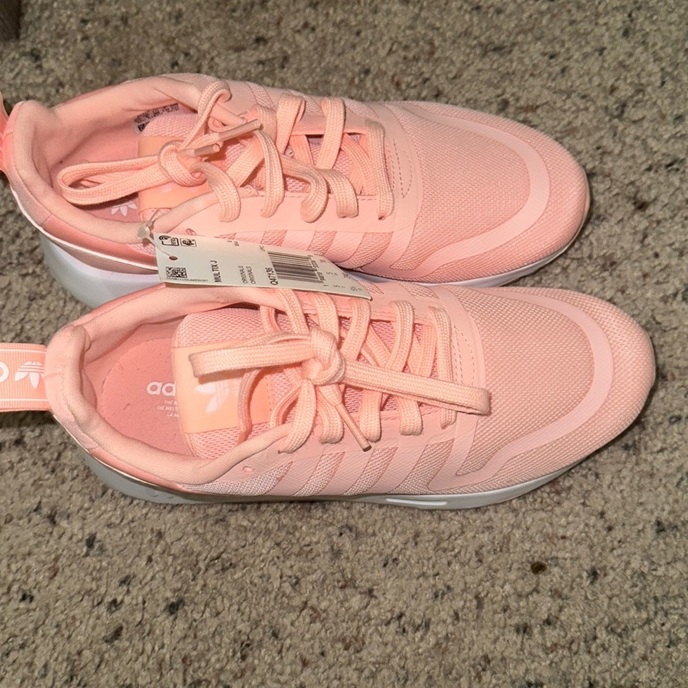 Pink and white Adidas women shoe 5 1/2